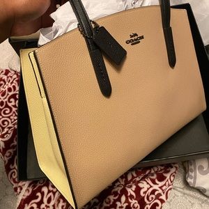Coach Charlie Carryall in Colorblock